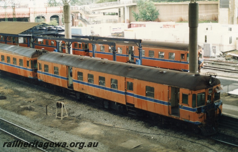 P18058
1 of 11 Construction of new Perth City station, two DMUs including ADG/V class 602, standing at platforms 6 and 7, Horseshoe Bridge, supports for new roof, Perth City station
