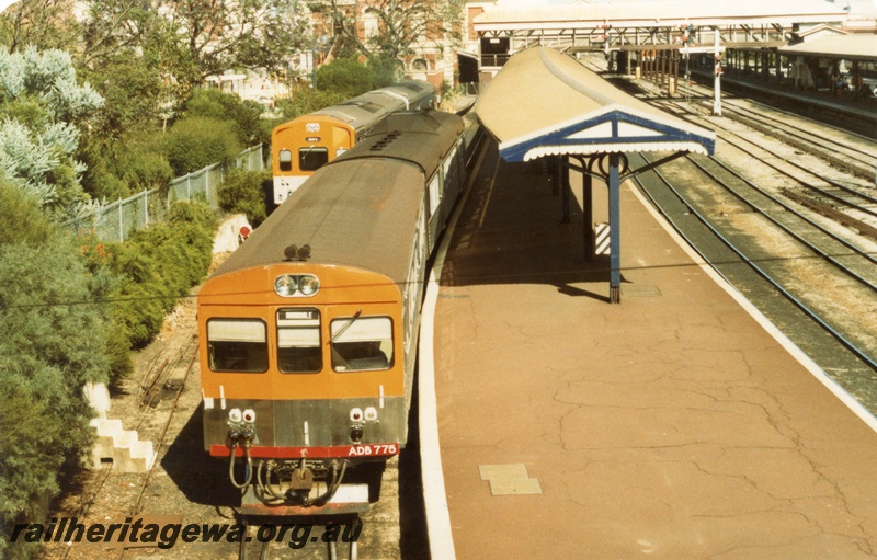 P18077
DMU set headed by ADC class 855, DMU set headed by ADB class 775, platform, canopy, pedestrian overpass, Perth city station, c1983
