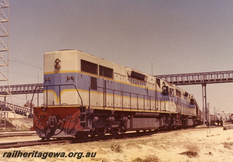 P18090
L class 260, with another diesel loco, light blue with dark blue and yellow stripe, double heading freight train, pedestrian overpass, Leighton, c1968
