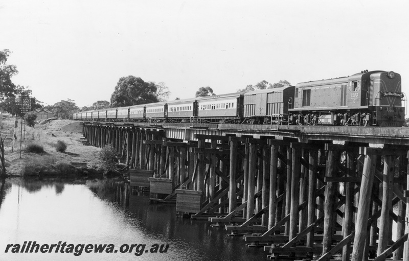 P18128
C class 1703 diesel locomotive hauling The Westland Express over the Swan River via the Guildford Bridge. ER line.
