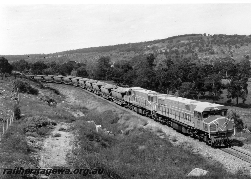 P18130
1 of 3 two unidentified DB class diesel locomotives hauling a loaded bauxite train on the Jarrahdale to Mundijong line.
