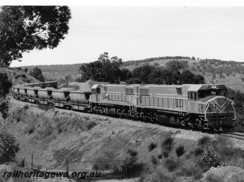 P18132
3 of 3 two unidentified DB class diesel locomotives hauling a loaded bauxite train on the Jarrahdale to Mundijong line.
