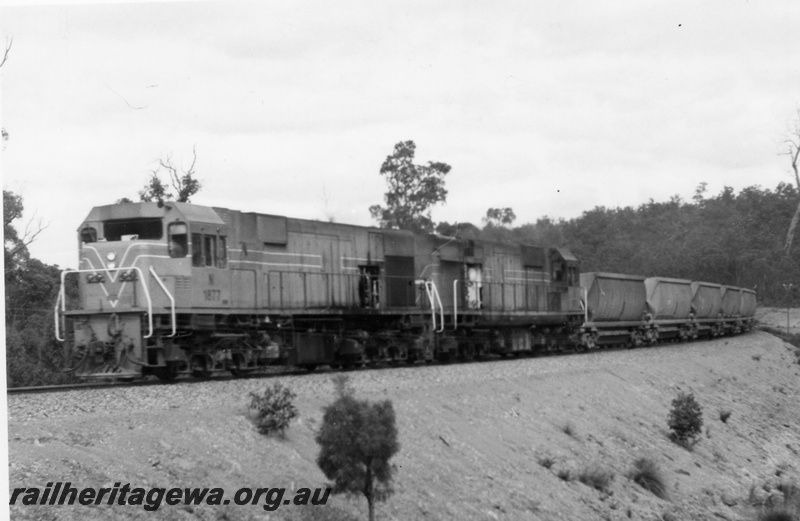 P18135
Unidentified N class diesel locomotives enroute from Mundijong to Jarrahdale with an empty bauxite train.
