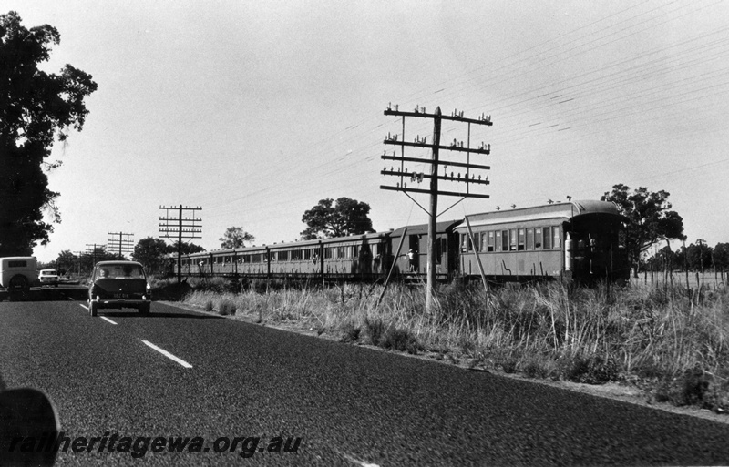 P18181
1 of 3 images of Donnybrook to Bunbury Vintage Train, G class 123, heading passenger cars including AL class 40, highway adjacent to track, PP line
