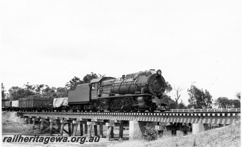 P18197
S class 545 on No 103 goods train, crossing low wood, concrete and steel bridge, near Hillman, BN line
