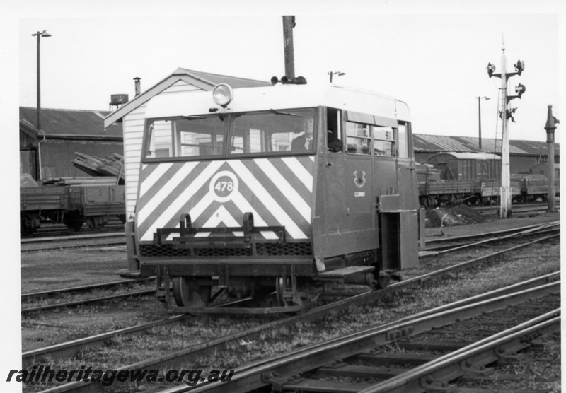 P18239
Wickham CCE car 478, bracket signal, water tower, rake of goods trucks, sheds, front and side view, ER line, en route to Avon carrying British Trade Minister and party on inspection tour

