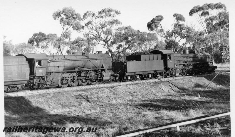 P18271
2 of 6 images of PM class 714 and V class 1223, double heading goods train No 12 from Narrogin to York via Brookton on GSR line, side view of locos 
