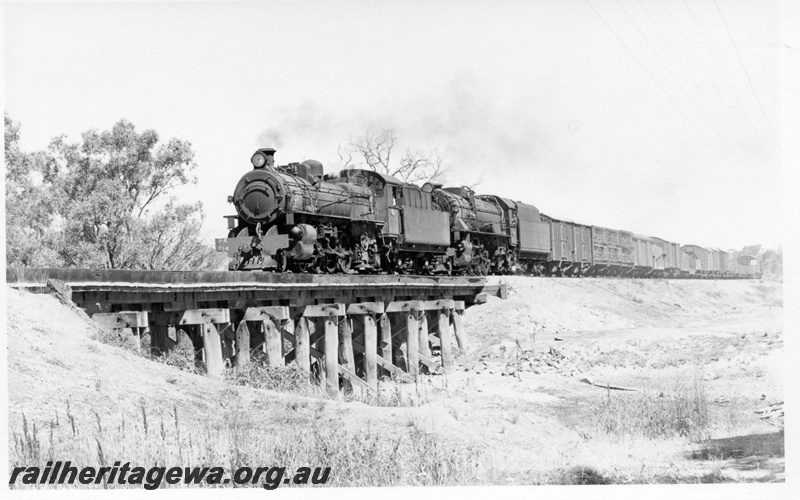 P18274
5 of 6 images of PM class 714 and V class 1223, double heading goods train No 12 from Narrogin to York via Brookton on GSR line, crossing wooden trestle bridge 
