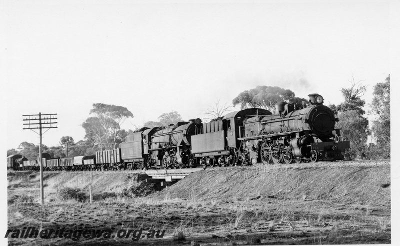 P18275
6 of 6 images of PM class 714 and V class 1223, double heading goods train No 12 from Narrogin to York via Brookton on GSR line, crossing small wooden trestle bridge 
