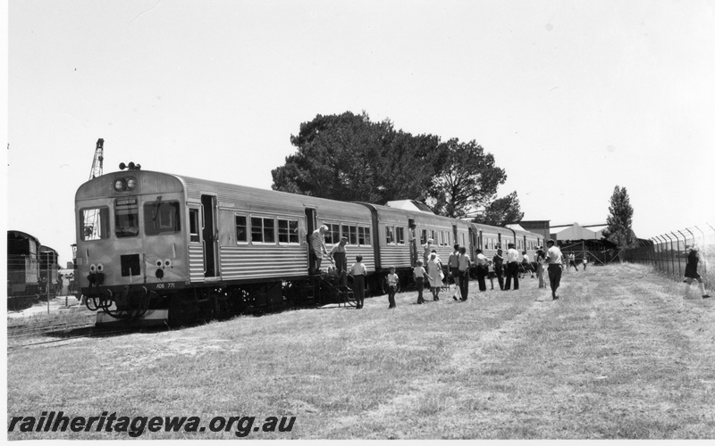 P18280
2 of 3 images of opening of the rail transport museum at Bassendean, ADB class 771 and three other stainless steel railcars, end and side view
