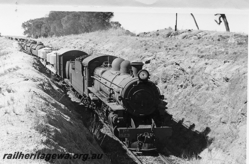 P18284
3 of 4 images of PR class 523 on goods train including JGS class 5022 tank wagon for furnace oil, in cutting, side and front view
