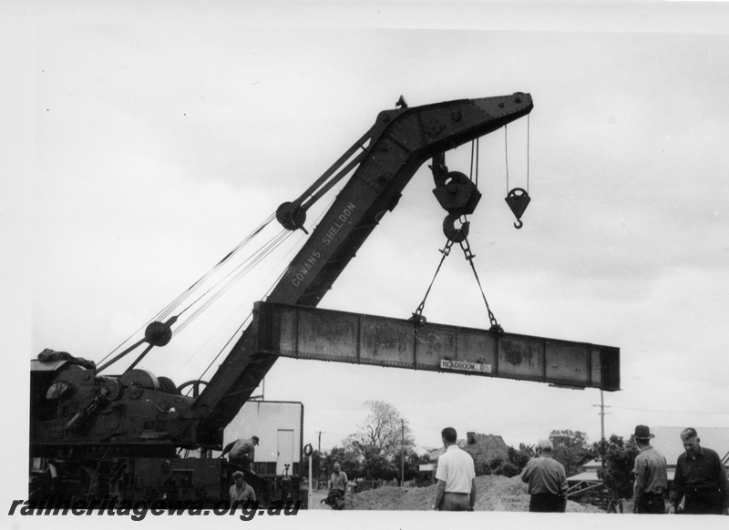 P18327
Cowans Sheldon crane, lifting steel beam, workers, demolition of West Midland station, ER line 
