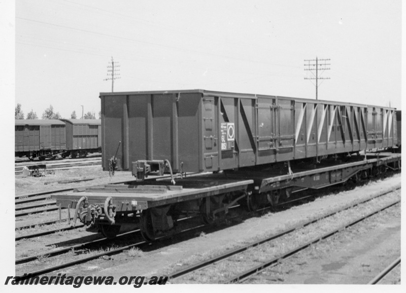 P18362
2 of 4 images of Commonwealth Railways (CR) wagons at Bassendean, including GL class 1851 on flat bed truck, end and side view
