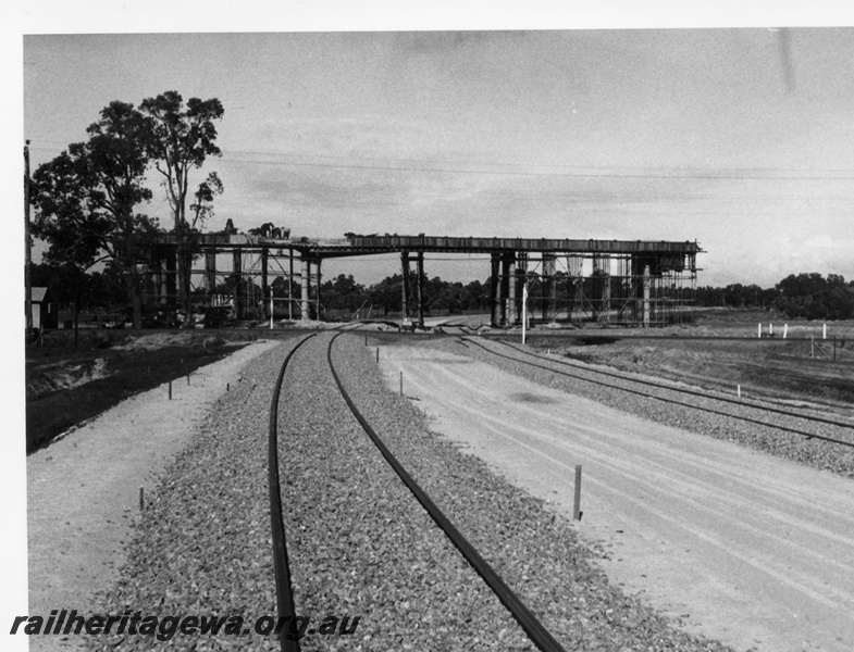 P18429
5 of 5 images of K class 203 on ballast train, flyover under construction, view of new track
