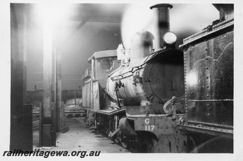 P18444
G class 117, inside Bunbury roundhouse, SWR line, side and front view

