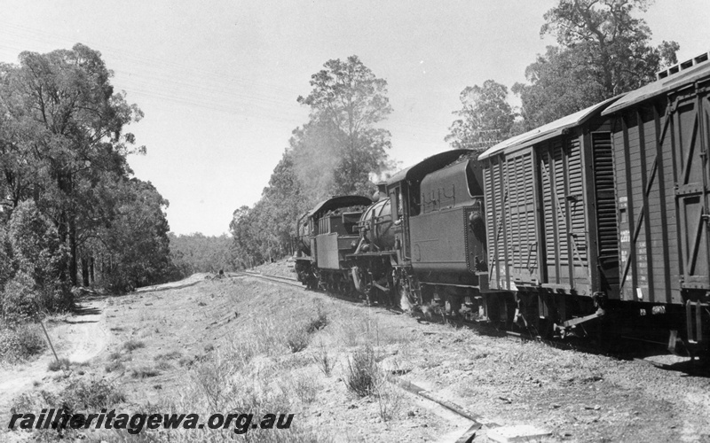 P18454
2 of 5 images of S class 548 and W class 921 double heading Donnybrook to Bridgetown special goods train on PP line, view along the side of the train looking towards the front
