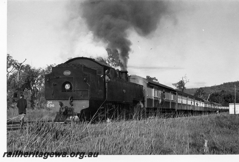 P18482
DD class 596, bunker first, blowing black smoke indicating use of Newcastle coal, on ARHS tour train, staff cabin, Isandra, PN line
