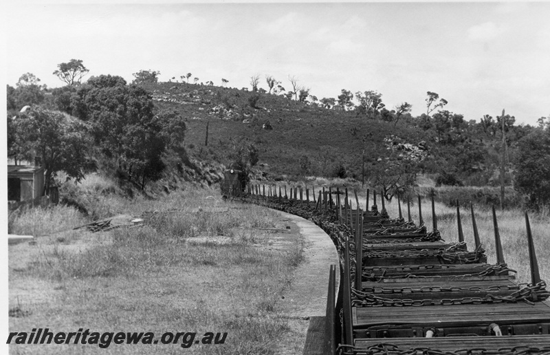 P18500
4 of 5 images of C class 1701 on reclamation train on old ER line, passing Swan View, view on curve from rear of the train to the front
