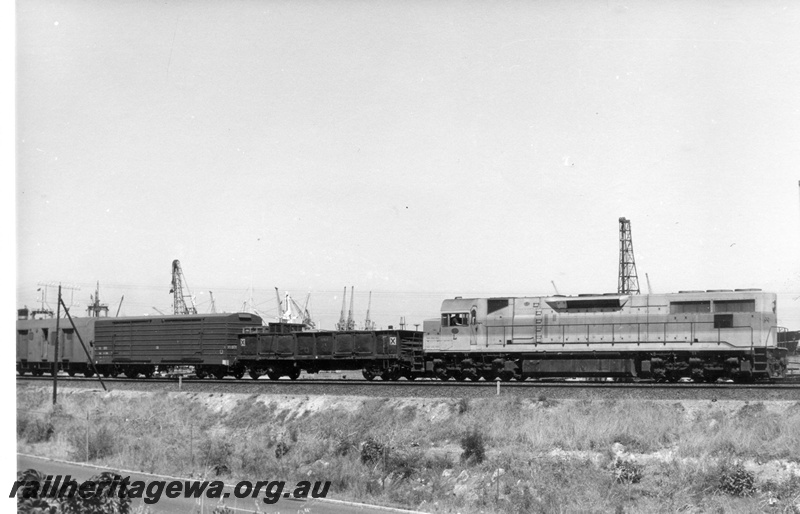 P18503
L class 257, on 1208 freighter, port cranes in background, side and end view 
