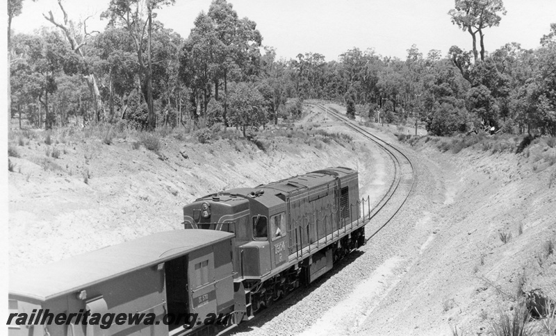 P18520
4 of 5 images of R class 1904 on bauxite service between Jarrahdale and Kwinana, ZC class 570 brakevan behind the loco, bauxite train in cutting, loco long end leading, approaching a level crossing.
