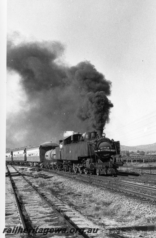 P18590
3 of 7 images of DM class 586 on ARHS tour train to Gingin on MR line, Millendon Junction, blowing black smoke from Newcastle coal
