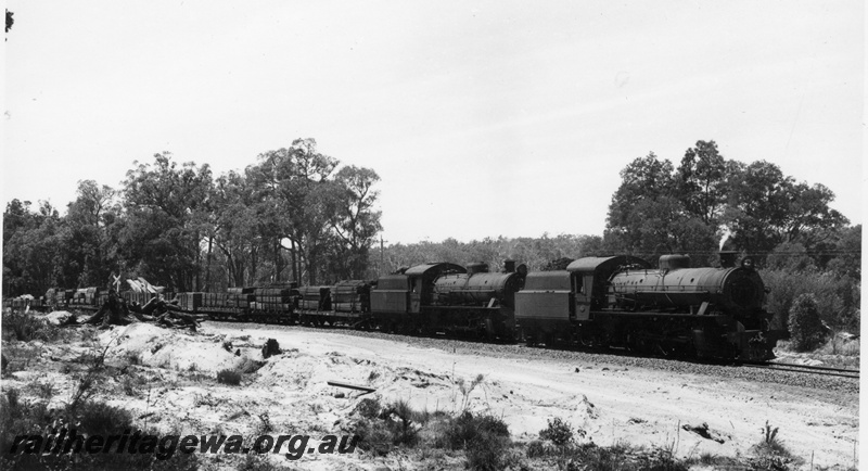 P18595
W class 922, W class 940, on No 344 goods train, level crossing, side and front view
