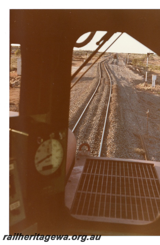 P18738
Mount Newman (MNM) Turner siding - drivers view of temporary trackwork following derailment.

