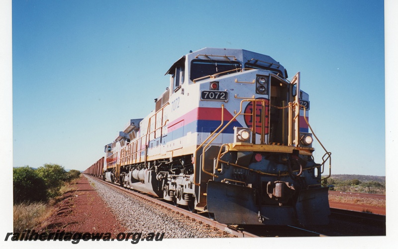 P19044
Hamersley Iron (HI) C44-9W class 7072 leads another CW44-9W locomotive near Mesa J on Robe River railway.
