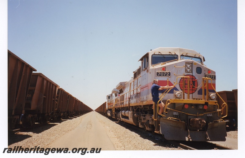 P19047
Hamersley Iron (HI) C44-9W class 7072 leads another C44-9W class locomotive on an empty iron ore train at 7 Mile Dampier.
