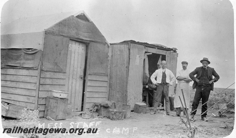 P19173
Commonwealth Railways (CR) huts, mess staff, horse camp, TAR line
