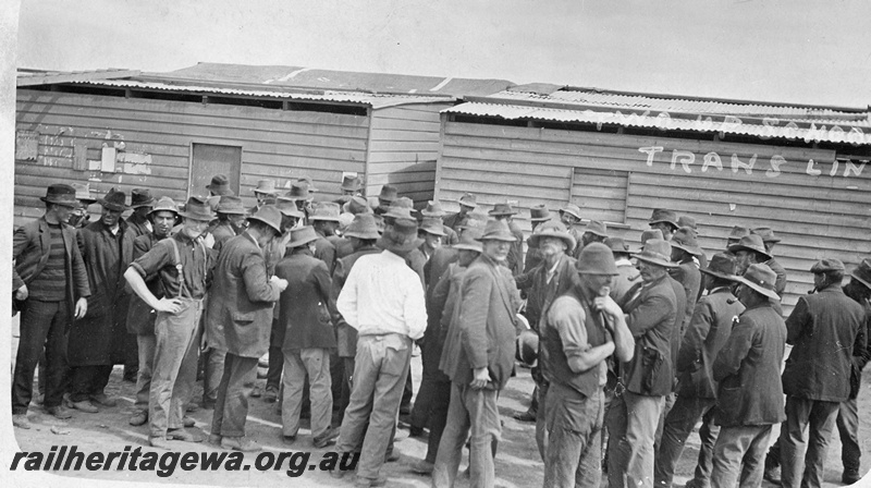 P19174
Two up school, wooden buildings, workers, Commonwealth Railways (CR) construction camp, TAR line, c1915-6
