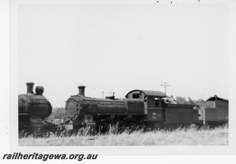 P19211
Fs class steam loco, awaiting scrapping, ex MRWA depot, Midland, ER line, front and side view
