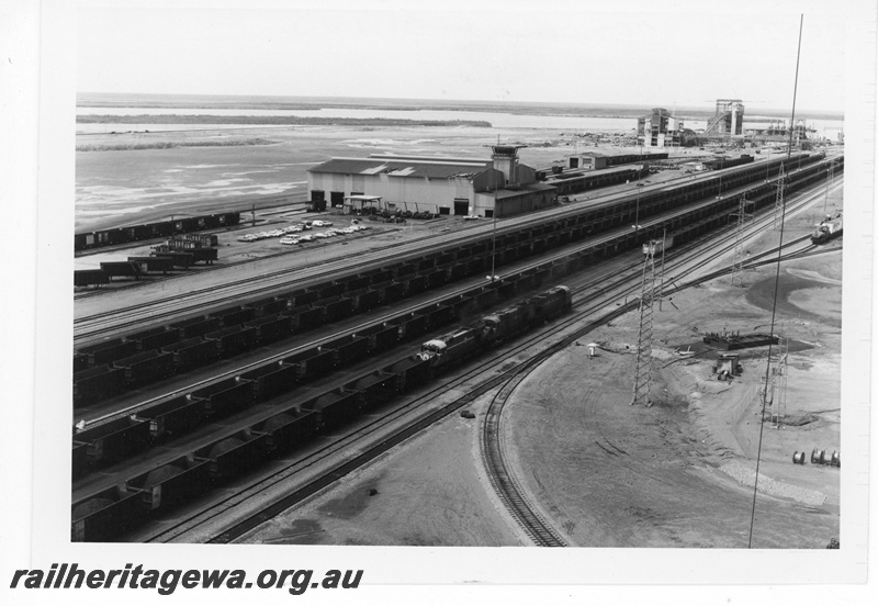 P19218
Mount Newman Mining (MNM) aerial view of Nelson Point rail facility showing car dumper and car repair depot.
