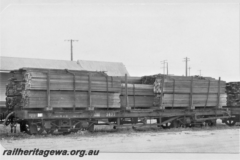 P19439
QBB class 3477 flat wagon with six bolsters with a load of sawn timber, brown livery, Rivervale, SWR line, end and side view
