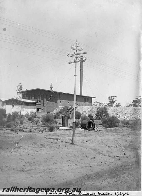 P19671
Gilgai - oppenheimer pole in foreground and Goldfields water pumping station in background. EGR line.
