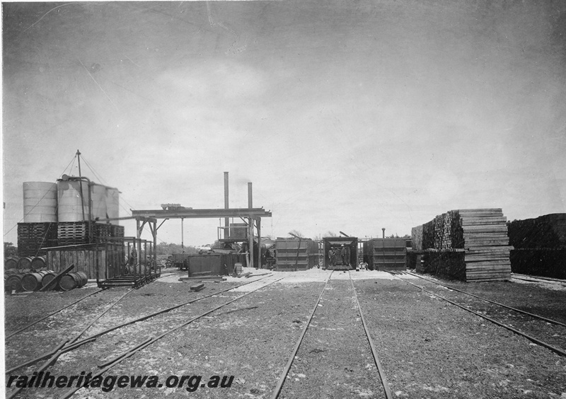 P19676
Bunbury - Sleeper powellising plant. The process treated karri sleepers against white ant infestation and dry rot. The process was developed to extend the life of jarrah forests. SWR line.
