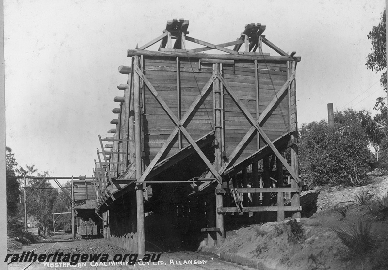 P19682
Allanson - Westralian Coal Mining Co rail coal loader. Wagon under loader. BN line.
