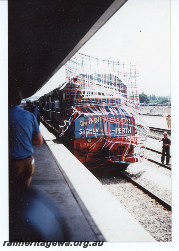 P19650
L class 260 breaking through a banner of streamers arriving at Perth Terminal on the inaugural 'Indian Pacific' passenger train from Sydney
