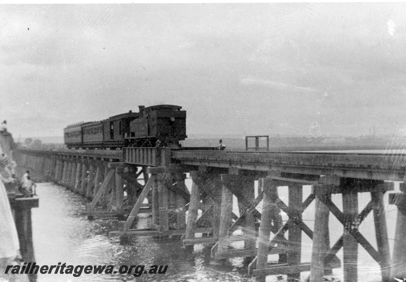 P19919
N class hauling passenger train over the Bunbury Bridge, East Perth. SWR line.
