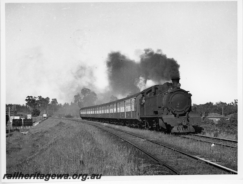 P20083
DS class loco, on passenger train comprising then new AY and AYB class carriages, road subway, houses, between Shenton Park and Daglish, loco emitting black smoke, ER line
