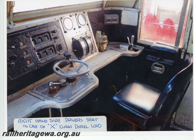 P20159
1 of 2 images of interior of cab of X class diesel, right hand side of cab, driver's seat, window and controls, internal view
