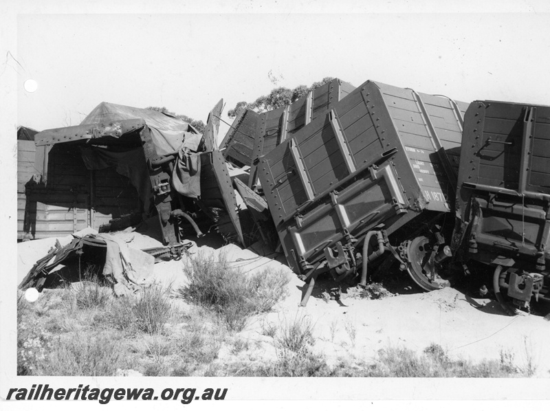 P20163
3 of 4 images of the derailed GH class wagons from No. 506 Goods between Calingiri and Piawaning, CM line
