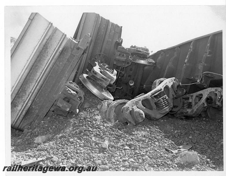 P20170
Derailment of loaded iron ore train near Southern Cross. Photo shows several rolled over WO class wagons and track damage. EGR line.
