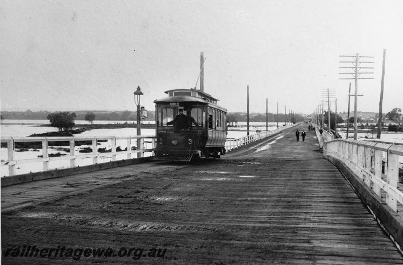 P20196
Single truck tram No. 3,  with a clerestory roof, crossing the old Causeway
