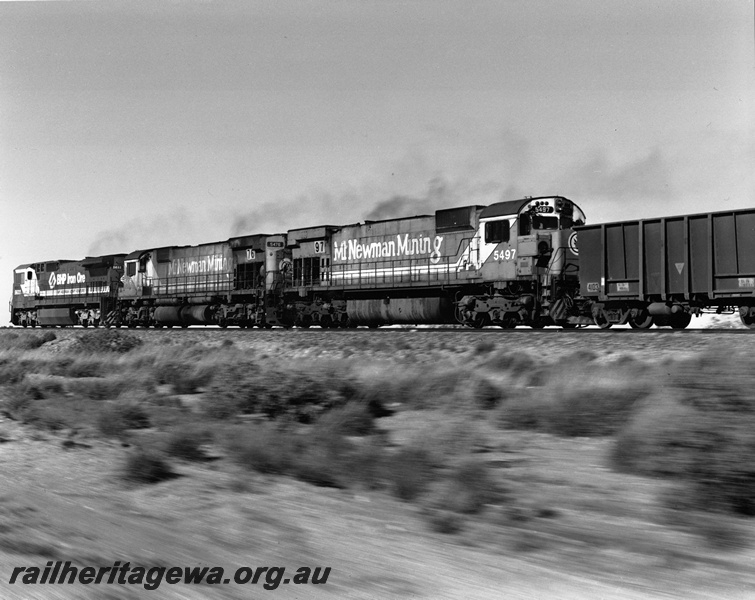 P20680
BHP Iron Ore GE CM40-8 Class 5636, Alcos M636 Class 5476 and 5497 in Mount Newman Mining orange livery, Pilbara, pacing shot
