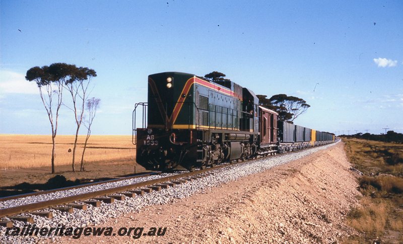 P20749
AB class 1533 (green with red/yellow stripe livery)  hauling ballast train near Salmon Gums. CE line.
