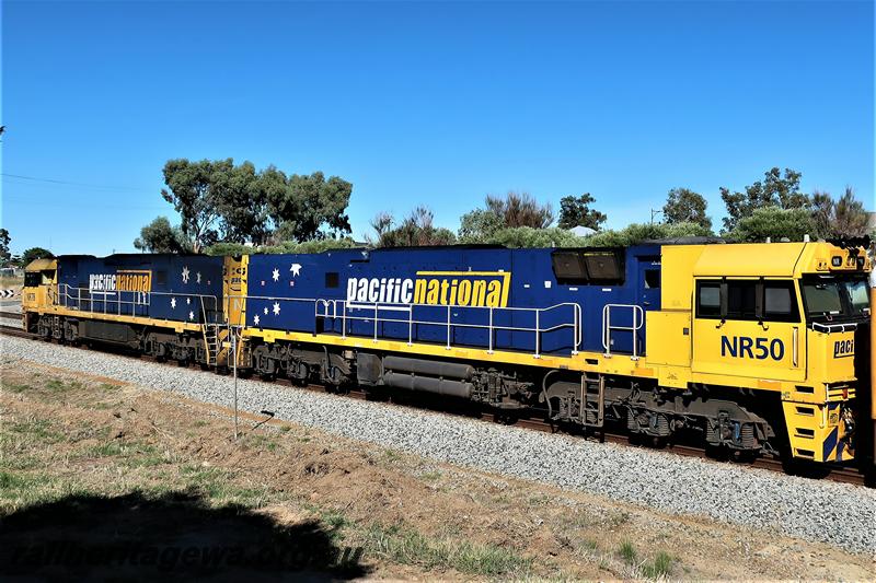 P21007
Pacific National NR class 50 in the yellow and blue livery hauling NR class 78 through Hazelmere en route to UGL's plant in Bassendean
