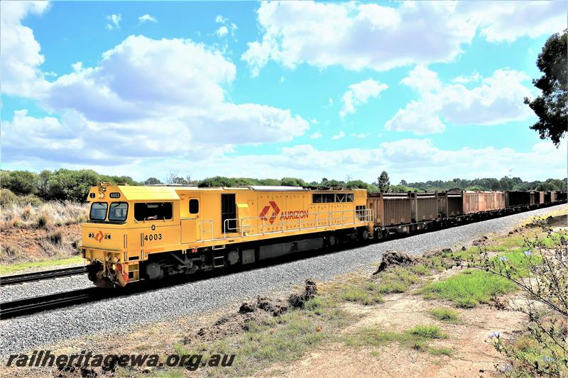 P21009
Aurizon Q class 4003, yellow livery with a red Aurizon logo on a south bound freight train through Hazelmere.
