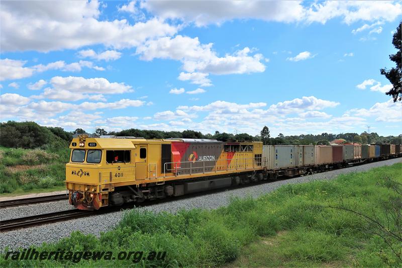 P21024
Aurizon Q class 4011 in the yellow with red and grey patches livery, hauling a south bound freight trough Hazelmere.
