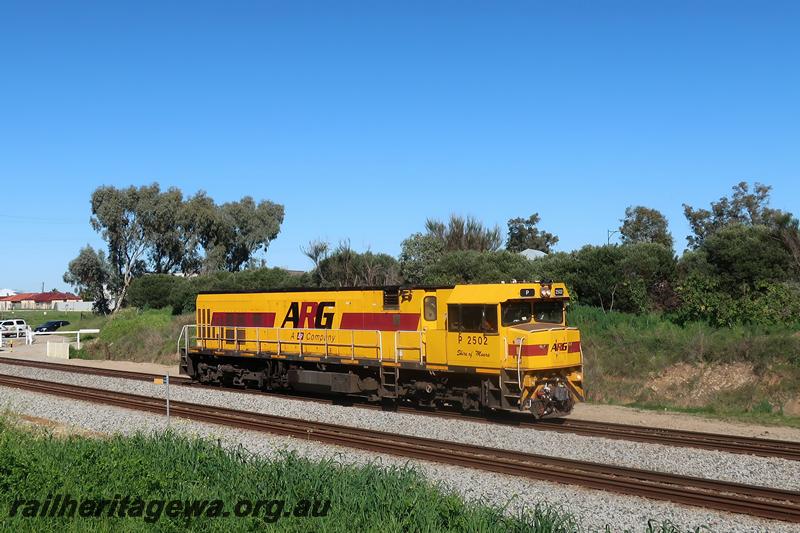 P21025
ARG P class 2502 Shire of Moora in the yellow with red stripe livery, in pristine condition, light engine heading northwards through Hazelmere, side and front view.

